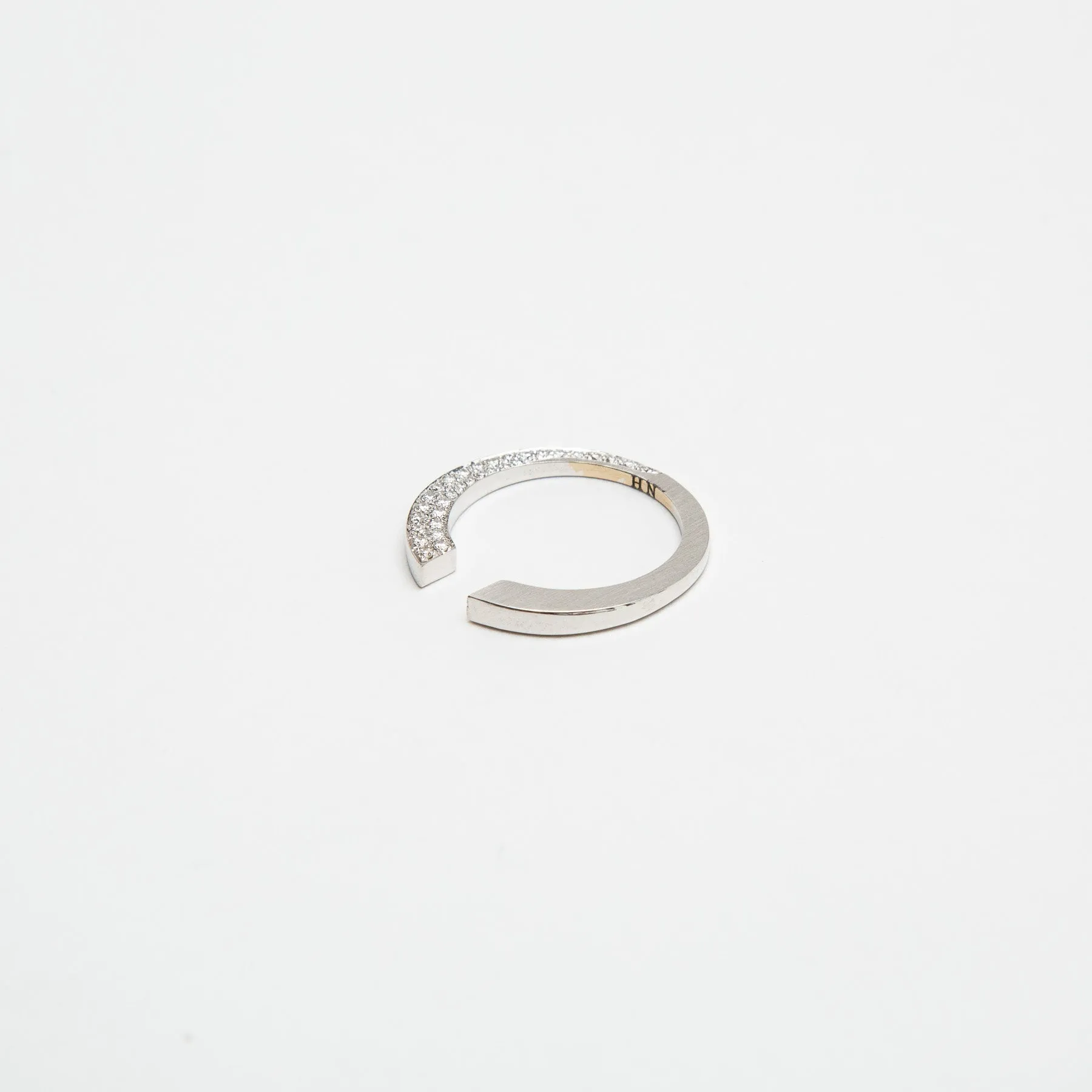 HADAR NORNBERG | HALF DIAMOND TITLED RING
